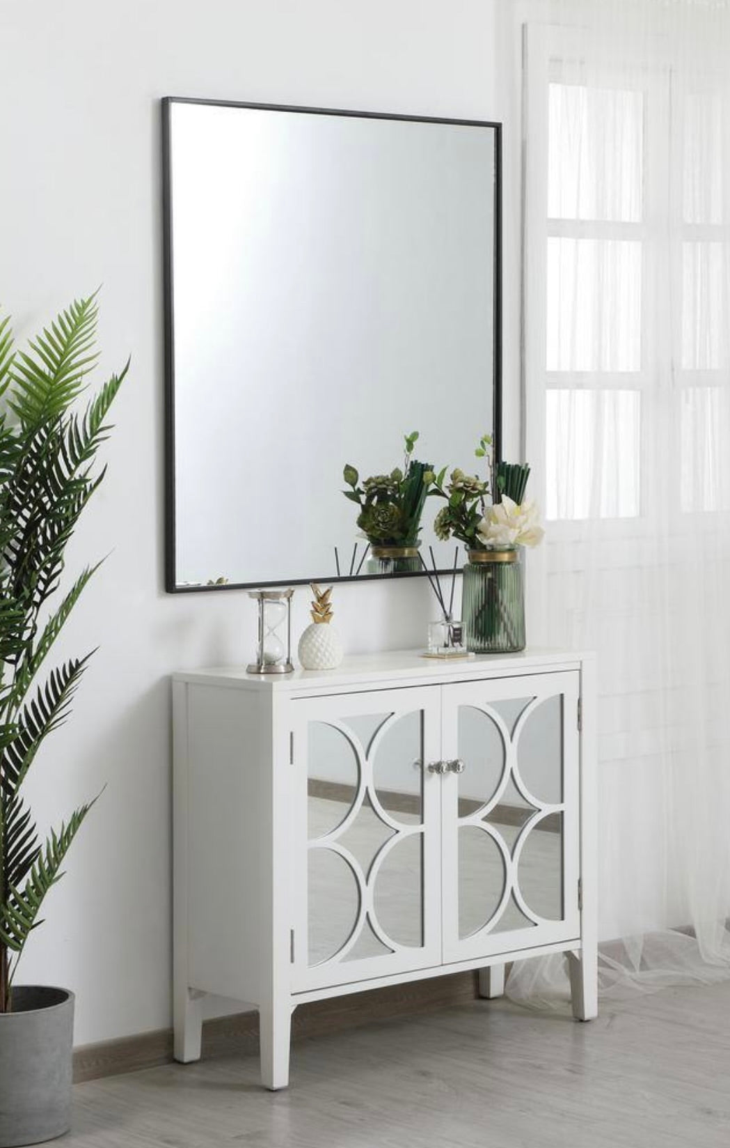 36"W x 40"H black mirror
