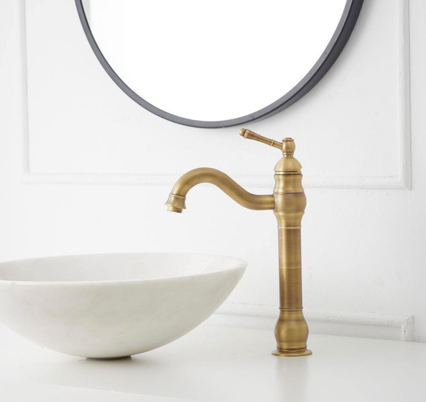 Vessel sink faucet in antique brass