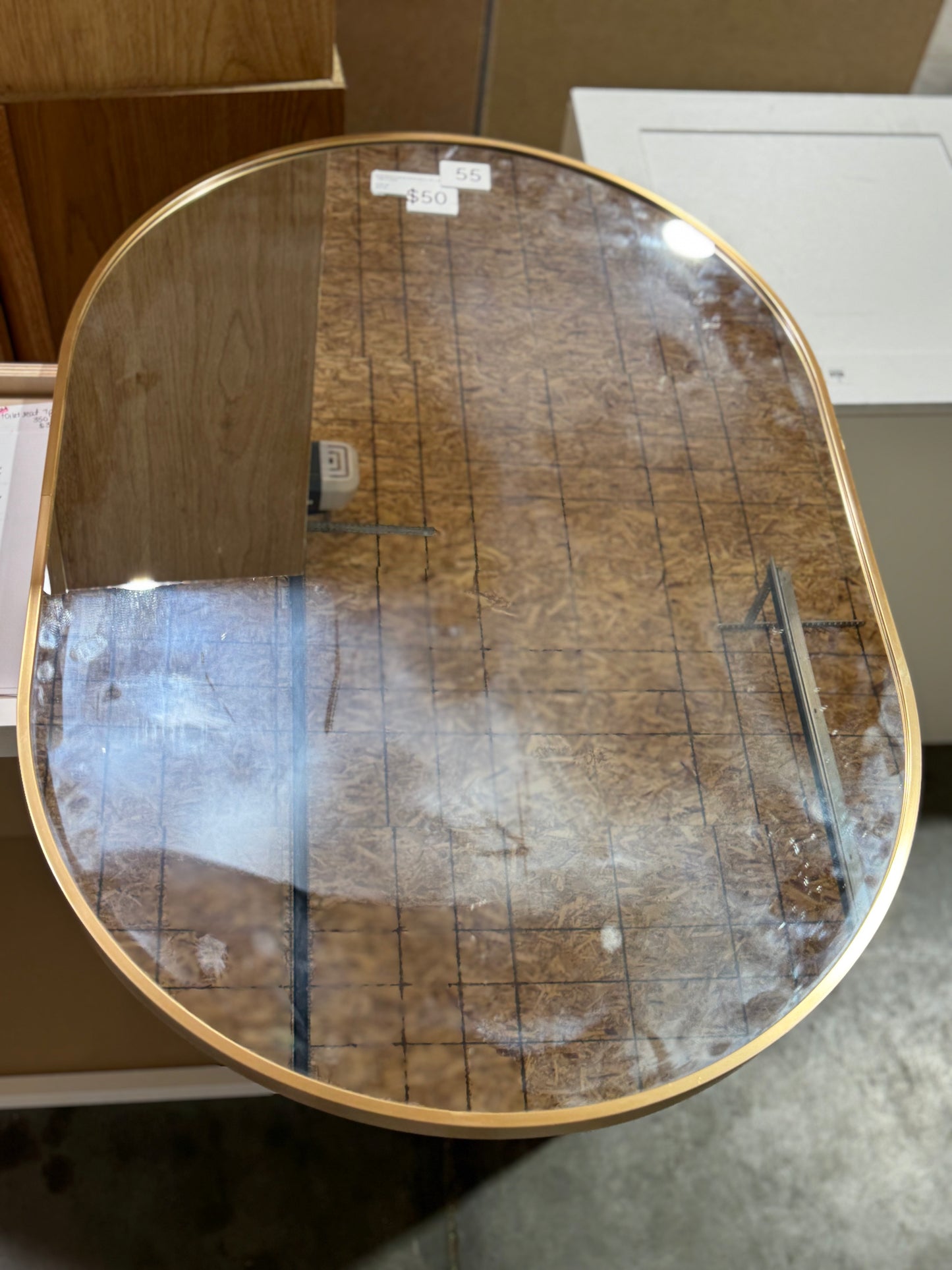 Medium oval gold mirror