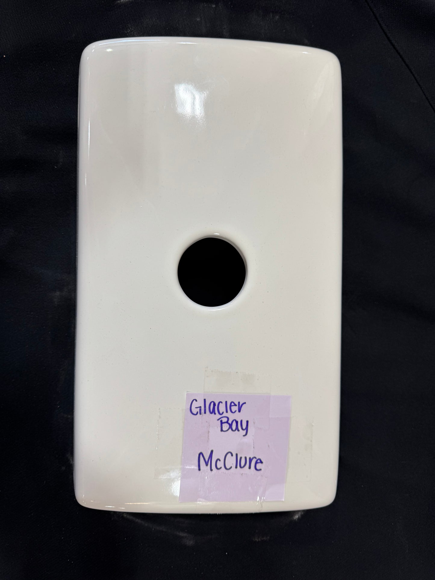 McClure toilet tank lid