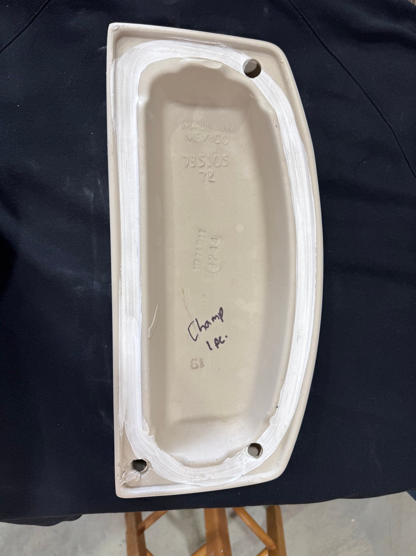 Champion 1 piece toilet tank lid