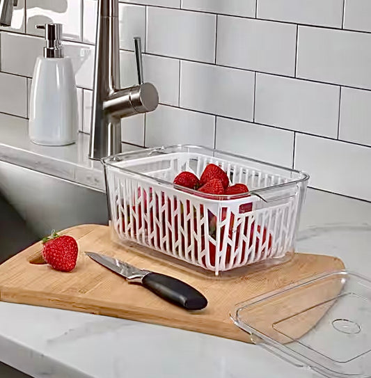 Storage container with strainer