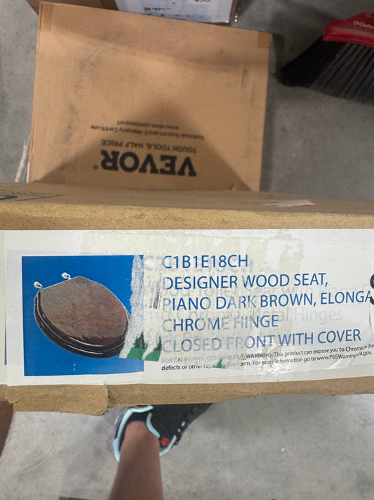 Elongated toilet seat in piano dark brown
