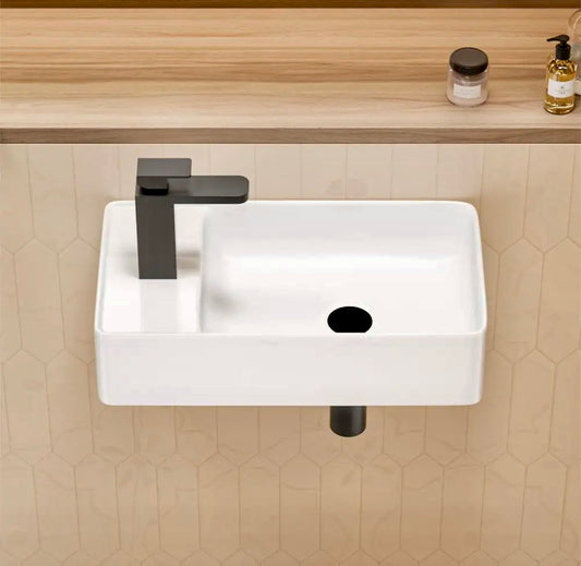 Wall mounted bathroom sink with faucet