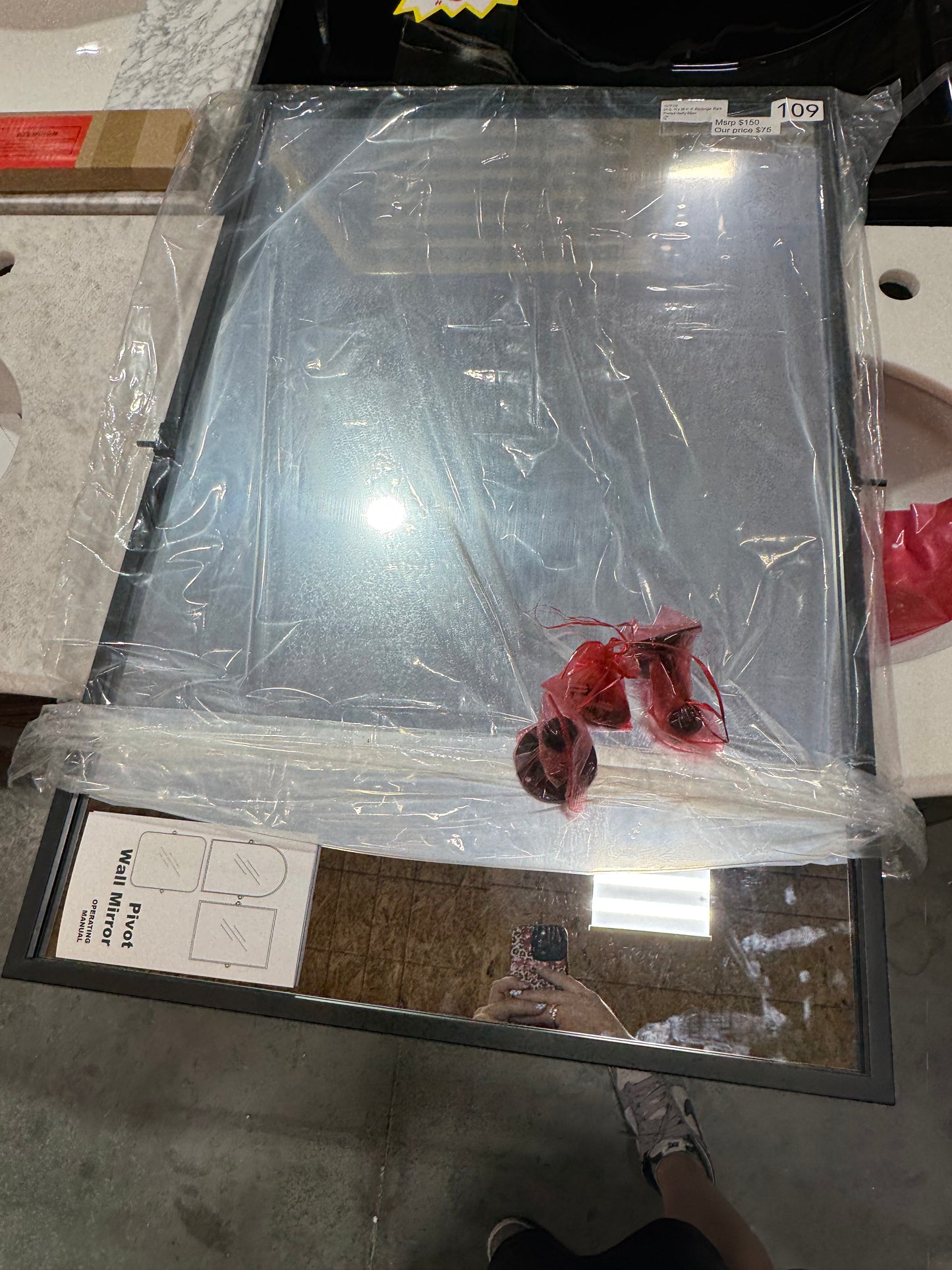 24"x36" rectangular black pivot mirror