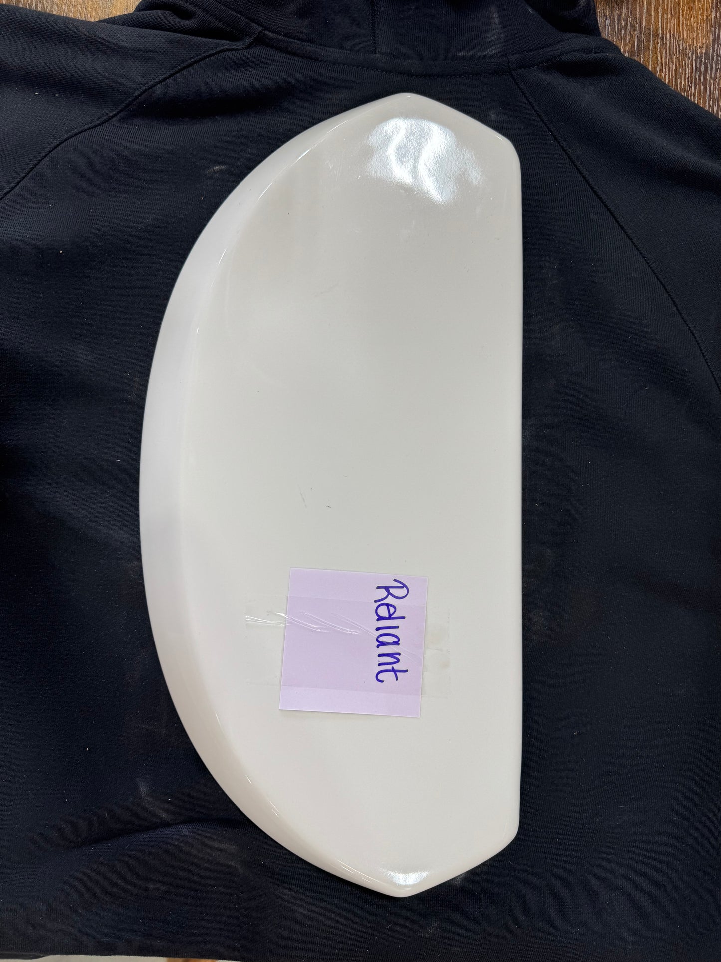 Reliant toilet tank lid